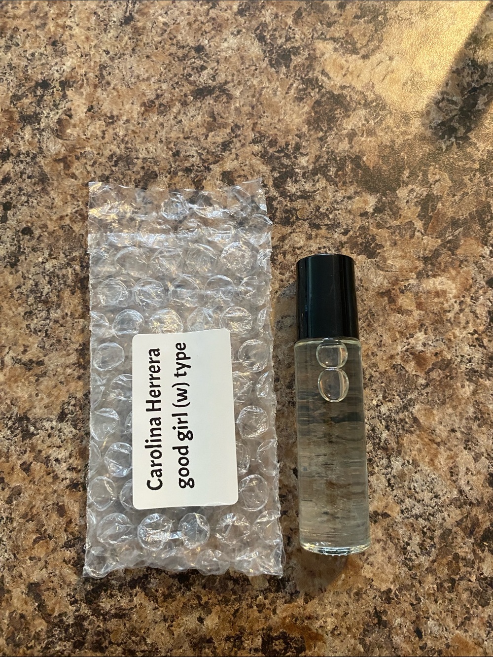 Carolina Herrera Good Girl Rollerball Sample in Clear and Black